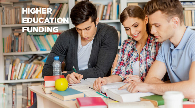 Three student gathered in a library, studying in collaboration.