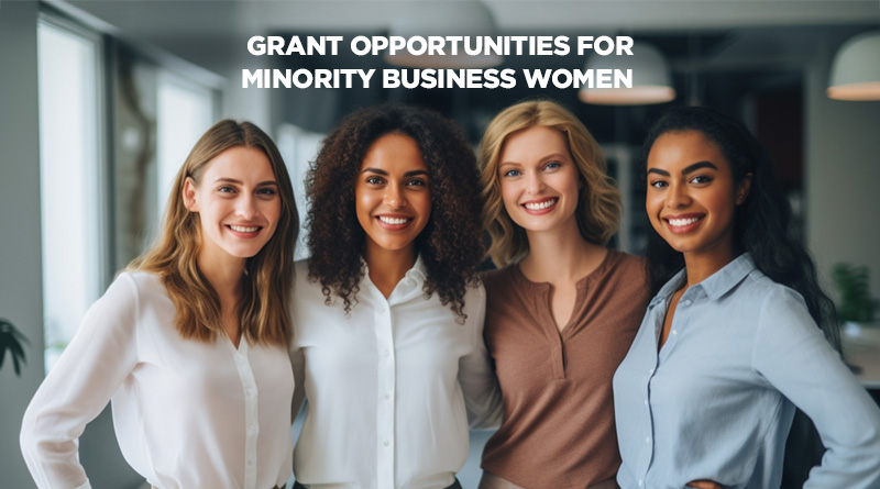 Four dynamic, forward-thinking minority business women standing together in solidarity.